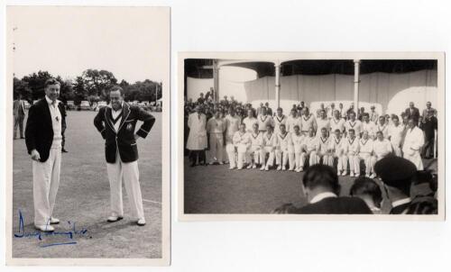 Kent v Australians 1956. Mono real photograph postcard of the captains, Doug Wright of Kent and Ian Johnson of Australia tossing for innings for the match played at Canterbury, 16th- 19th June 1956. The postcard nicely signed to the photograph in blue ink