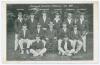 &lsquo;Australian Cricketers. American Tour 1913&rsquo;. Scarce mono postcard of the Australian touring team, standing and seated in rows, wearing tour caps and blazers. Title and players names to top border, further players names to lower border. Players include Dia