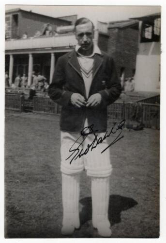 George Owen Dawkes. Leicestershire & Derbyshire 1937-1961. Original real photograph mono postcard of Dawkes, full length, wearing cricket attire and Derbyshire sweater. Nicely signed in ink to lower border &lsquo;George Dawkes&rsquo;. Series unknown. Postally unused.