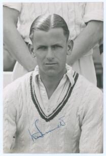 George Malcolm Emmett. Gloucestershire & England 1936-1959. Mono real photograph postcard of Emmett, head and shoulders wearing cricket attire. Nicely signed in blue ink to the photograph by Emmett. Official stamp to verso for A. Wilkes & Son, West Bromwi
