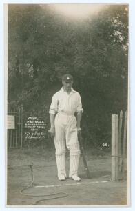 Charles Philip &lsquo;Phil&rsquo; Mead. Hampshire & England 1905-1936. Early mono real photograph postcard of Mead standing full length in cricket attire and Hampshire cap, leaning on his bat. The photograph taken at Bournemouth with printed caption to the photograph
