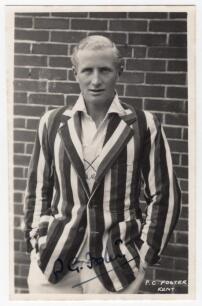 Peter Geoffrey Foster. Oxford University & Kent 1936-1946. Mono real photograph postcard of Foster standing three quarter length wearing cricket attire and striped blazer. Nicely signed in black ink to the photograph by Foster. Printed title &lsquo;P.G. Foster.