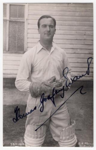 Thomas Godfrey Evans. Kent & England 1939-1967. Mono real photograph plain back postcard of Evans standing three quarter length wearing wicket-keeping attire. Nicely and fully signed in black ink &lsquo;Thomas Godfrey Evans&rsquo; to the photograph. Printed title &lsquo;T.