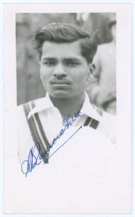 Sonny Ramadhin. Trinidad, Lancashire & West Indies 1949-1965. Mono real photograph plain back postcard of Ramadhin, head and shoulders wearing cricket attire. Very nicely signed in blue ink to the photograph by Ramadhin. Official stamp to verso for A. Wil