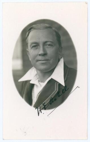 William Ewart Astill. Leicestershire & England 1906-1939. Mono real photograph plain back postcard of Astill in cameo, head and shoulders wearing cricket attire and blazer. Very nicely signed in black ink to the photograph by Astill. Official stamp to ver