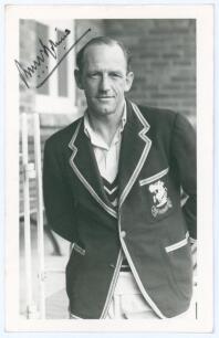 Robert Walter Vivian Robins. Middlesex, Cambridge University & England 1925-1951. Mono real photograph plain back postcard of Robins standing three quarter length at Scarborough, wearing an M.C.C. tour blazer. Very nicely signed in black ink to the photog