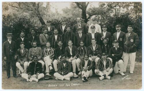 &lsquo;Sussex and All India&rsquo; Hove 1911. Rare and early sepia real photograph postcard of the Sussex and Indian teams seated and standing in rows wearing cricket attire and assorted blazers for the match played at Hove, 21st- 23rd August 1911. Players who featur