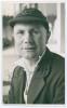 John George Langridge. Sussex 1928-1955. Mono real photograph plain back postcard of Langridge, head and shoulders wearing Sussex cap. Signed in ink to the photograph by Langridge. Official stamp to verso for A. Wilkes & Son, West Bromwich. Postally unuse