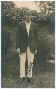 Robert Richard &lsquo;Bob&rsquo; Relf. Sussex 1905-1933. Early sepia real photograph postcard of Relf standing full length wearing cricket attire, blazer and Sussex cap. Nicely signed in ink to the photograph by Relf. Official stamps to verso for Nias and A.G. Spaldi