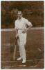Herbert Percy Chaplin. Europeans & Sussex 1904-1914. Early sepia real photograph postcard of Chaplin standing full length at the wicket, leaning on his bat. Nicely signed in ink to the lower right hand corner of the photograph by Chaplin. Printed title &lsquo;H
