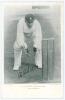 Arthur Frederick Augustus &lsquo;Dick&rsquo; Lilley. Warwickshire, London County & England 1894-1911. Early mono postcard of Lilley crouching at the stumps in wicket-keeping attire wearing Warwickshire cap. Printed title in red to lower margin. Nicely signed in black