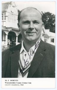 Martin John Horton. Worcestershire, Northern Districts & England 1952-1971. Mono real photograph postcard of Horton, head and shoulders wearing cricket attire and blazer. Nicely signed in black ink to the photograph by Horton. Printed title to lower borde
