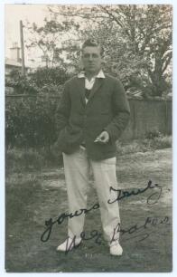 William Ederick &lsquo;Eddie&rsquo; Bates. Yorkshire & Glamorgan 1907-1931. Sepia real photograph postcard of Bates standing full length wearing cricket attire and blazer. Nicely signed in ink to the photograph &lsquo;Yours truly, W.E. Bates&rsquo;. Blind embossed stamp to lower