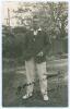 William Ederick &lsquo;Eddie&rsquo; Bates. Yorkshire & Glamorgan 1907-1931. Sepia real photograph postcard of Bates standing full length wearing cricket attire and blazer. Nicely signed in ink to the photograph &lsquo;Yours truly, W.E. Bates&rsquo;. Blind embossed stamp to lower