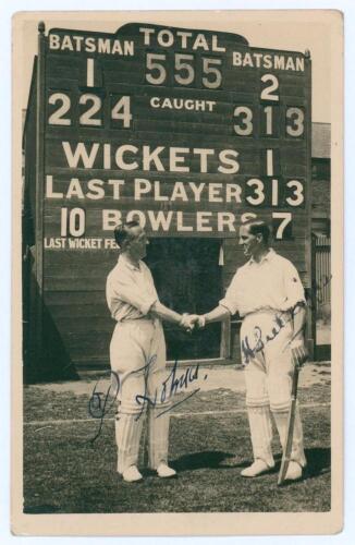 Yorkshire. Record opening stand. Herbert Sutcliffe and Percy Holmes. Yorkshire and England 1932. Mono real photograph postcard of the scoreboard at Leyton in 1932 showing the Yorkshire record 1st wicket stand of 555 and Hutton and Holmes stood beneath sha