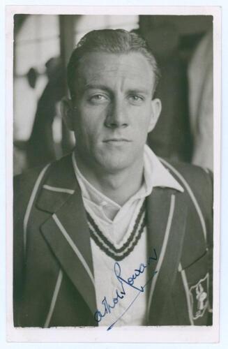 Athol Matthew Burchell Rowan. Transvaal & South Africa 1939-1951. Mono real photograph plain back postcard of Rowan, head and shoulders wearing tour blazer. Nicely signed in blue ink to the photograph by Rowan. Official stamp to verso for A. Wilkes & Son,
