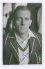 Athol Matthew Burchell Rowan. Transvaal & South Africa 1939-1951. Mono real photograph plain back postcard of Rowan, head and shoulders wearing tour blazer. Nicely signed in blue ink to the photograph by Rowan. Official stamp to verso for A. Wilkes & Son,