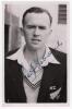 Geoffrey Osborne &lsquo;Geoff&rsquo; Rabone. Wellington, Auckland & New Zealand 1940-1960. Mono real photograph plain back postcard of Rabone, head and shoulders wearing tour blazer. Nicely signed in ink to the photograph by Rabone and dated 1949. Official stamp to v