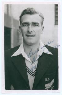 Bert Sutcliffe. Auckland, Otago, Northern Districts & New Zealand 1946-1966. Mono real photograph plain back postcard of Sutcliffe, head and shoulders wearing tour blazer. Nicely signed in ink to the photograph by Sutcliffe, partly to the darker part of t