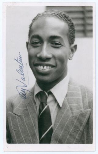 Alfred Louis Valentine. Jamaica & West Indies 1949-1965. Mono real photograph plain back postcard of Valentine, head and shoulders wearing a suit and tie. Very nicely signed in blue ink to the photograph by Valentine. Official stamp to verso for A. Wilkes