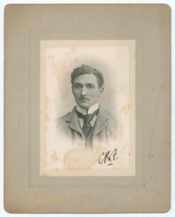 Charles Burgess Fry. Sussex, Hampshire, Oxford University, Europeans & England 1892-1922. A superb studio portrait photograph of Fry, head and shoulders, wearing shirt, tie and three piece suit. Nicely signed in his initials &lsquo;C.B.F.&rsquo; in black ink by Fry t