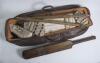 Leather cricket bag and kit. An early leather cricket bag containing a full size bat by Cobbett of Marylebone with serial number D.50291 stamped to rear splice. A pair of &lsquo;Tony Lock Junior&rsquo; size 8 canvas cricket boots, hardly used. Also two pairs of batti