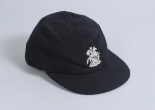 M.C.C./England navy blue touring cap with embroidered England emblem of St. George and the Dragon to front. Good condition. Ownership unknown.