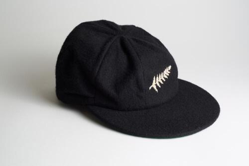 New Zealand black cloth Test cap, by Westminster, Freister, with embroidered &lsquo;silver fern&rsquo; emblem of New Zealand to cap. Appears match worn, good condition. Ownership unknown.