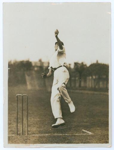 Maurice William Tate. Sussex & England 1912-1937. Original sepia press action photograph of Tate in bowling pose mid-delivery wearing cricket attire and cap. The photograph by Sport & General, London c.1920, measures 6&rdquo;x8&rdquo;. Wear and nicks to edges, otherw