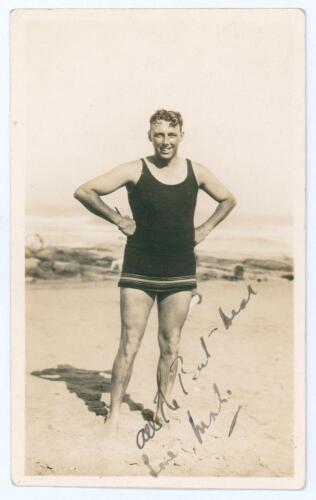 Maurice William Tate. Sussex & England 1912-1937. Original candid style sepia photograph of Tate standing full length on the beach in swimming attire. Signed in ink to the front with dedication by Tate, with further annotation in ink to verso &lsquo;All of us h
