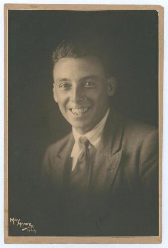 Maurice William Tate. Sussex & England 1912-1937. Excellent mono studio portrait photograph of a smiling Tate, head and shoulders wearing a suit and tie, nicely signed in ink to the darker part of the photograph by Tate. The photograph, by May Moore of Sy