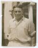 Maurice William Tate. Sussex & England 1912-1937. Original sepia press photograph of Tate, half length wearing cricket attire, taken on 8th August 1930 during the match Sussex v Surrey at Hastings. Photograph by L.N.A., London. 6.5&rdquo;x8.5&rdquo;. Wear, creasing a