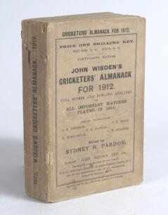 Wisden Cricketers&rsquo; Almanack 1912. 49th edition. Original paper wrappers. Some wear, staining and age toning to wrappers, some splitting to the hinge of the front wrapper, some loss to the spine paper otherwise in good condition