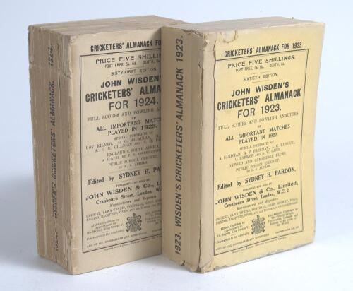 Wisden Cricketers&rsquo; Almanack 1923 and 1924. 60th & 61st editions. Original paper wrappers. The 1923 edition with facsimile spine paper, some faults and staining to wrappers otherwise in generally good condition. The 1924 edition with breaking to spine bloc