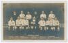 Tottenham Hotspur Cup Team 1921-22. &lsquo;Hotspur Team&rsquo;. Early mono real photograph postcard of the team and trainer, Minter, standing and seated in rows on the pitch with printed title and players names printed beneath, to lower border. Appears to be W.J. Cra