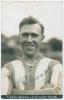 Thomas Edwin Reed &lsquo;Tommy&rsquo; Cook. Sepia real photograph plain back postcard of Cook head and shoulders wearing Brighton & Hove Albion football shirt. Printed title &lsquo;T. Cook, Brighton & Hove Albion 1925-26&rsquo;. Signed in ink to photograph by Cook. Brighton Cam