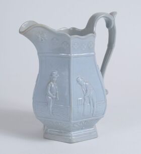 Cricket jug. A light blue mid 19th century Staffordshire salt-glaze jug, the hexagonal bulbous body divided into six panels with cricketers wearing top hats, probably Lillywhite, Pilch and Box. Above and below are stylised floral decorations and scrolled 