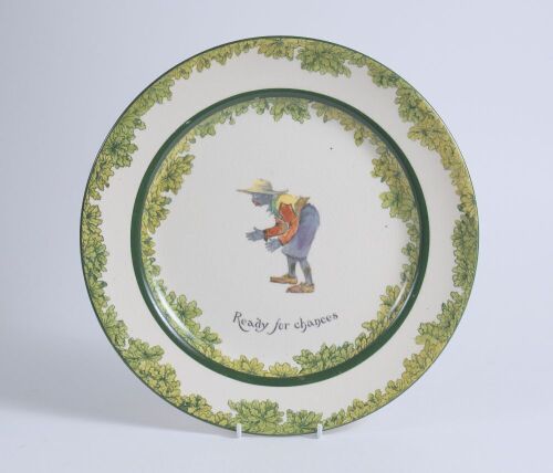 &lsquo;Ready for Chances&rsquo;. A Royal Doulton Black Boy dinner plate, entitled &lsquo;Ready for Chances&rsquo; printed with a boy in red shirt, yellow waistcoat and a floppy hat crouched awaiting a catch (as if in the slips). Green floral decoration to inner and outer rim. 10