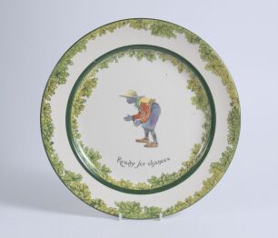 &lsquo;Ready for Chances&rsquo;. A Royal Doulton Black Boy dinner plate, entitled &lsquo;Ready for Chances&rsquo; printed with a boy in red shirt, yellow waistcoat and a floppy hat crouched awaiting a catch (as if in the slips). Green floral decoration to inner and outer rim. 10