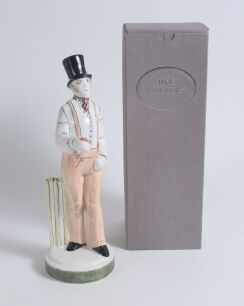 &lsquo;The Rye Bowler&rsquo;. Rye Pottery 2013. Tall figure of a bowler wearing a top hat, holding out a cricket ball, the figure based on William Lillywhite, who played for England, Sussex and Rye. The figure stands 11.5&rdquo; tall. Rye Pottery stamps to base with year 2