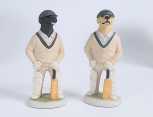 &lsquo;Black and Yellow Labrador batsmen&rsquo;. Robert Harrop Designs &lsquo;Doggie People&rsquo; CC36A figures of a batsman labrador wearing a cap with bat in paw, one black and one. Both 5.5&rdquo; tall. In original boxes. Qty 2