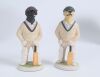 &lsquo;Black and Yellow Labrador batsmen&rsquo;. Robert Harrop Designs &lsquo;Doggie People&rsquo; CC36A figures of a batsman labrador wearing a cap with bat in paw, one black and one. Both 5.5&rdquo; tall. In original boxes. Qty 2