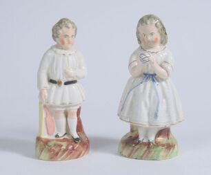 Staffordshire cricket figures. Pair of original decorative Staffordshire 19th century pottery figures depicting a boy holding a cricket bat, wearing a white smock coat with belt, and a girl, in three quarter length dress, holding a ball. Approximately 6&rdquo; 