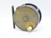 A good Hardy Brass Faced Perfect 3 &frac34;" salmon fly reel, ivorine handle, later factory fitted ribbed brass foot, strapped rim tension screw and early calliper spring check mechanism, slightly dished drum with four rim cusps and milled nickel silver locking
