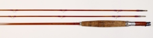 A good Orvis "Battenkill" 2 piece (2 tips) impregnated cane trout/single handed salmon fly rod, 8', GBF 8, 4 3/8oz, tan silk wraps, wooden reel seat with alloy screw grip fitting, suction joint, serial no. 71744, handle discolored from normal use otherwi