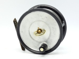 A Hardy Uniqua 3 &frac12;" light salmon fly reel, "spitfire" alloy drum with ebonite handle and nickel silver telephone latch, ribbed brass foot, fixed Mk.II check, only very light signs of use and in in cream card box, 1940's
