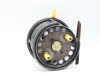 A Hardy Silex No.2 Extra Wide Drummed 4 &frac12;" bait casting reel, shallow drum with slotted core, twin ivorine handles and three screw release latch, brass foot, cut-away rim section, rim mounted ivorine casting trigger and milled tension regulator with rear