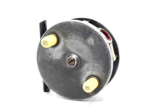 A rare Hardy Combined Fly Spinning 3 5/8" light salmon reel, lipped solid drum with twin ivorine handles, raised spindle boss and domed brass locking screw, bridge foot and brass annular triple pillared frame fitted with factory red agate and nickel silve