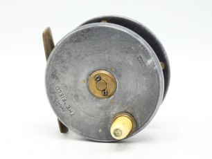 A very rare Hardy Field 2 5/8" trout fly reel, alloy faceplate with lipped rim, two screw spindle boss and domed ivory handle on milled brass cup, contracted brass drum, waisted brass bridge foot, triple hollow brass drum pillars, faceplate stamped model 