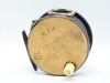 A Hardy Brass Faced Perfect 4" salmon fly reel, domed ivorine handle, brass foot (neatly filed), fixed nickel silver line guide, strapped rim tension screw with Turk's head locking nut and 1906 calliper spring check mechanism, drum with four rim cusps and
